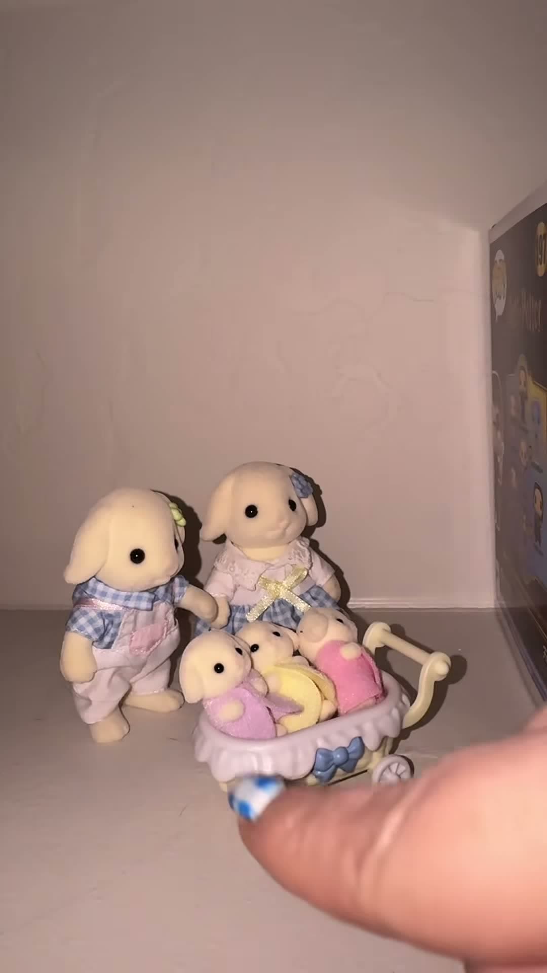 Collectible animal figures arranged on a shelf