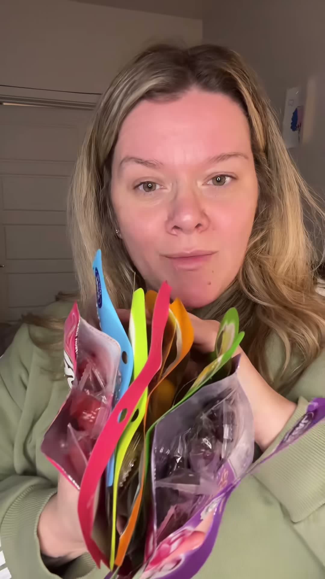 Novelty candy packets held up to camera