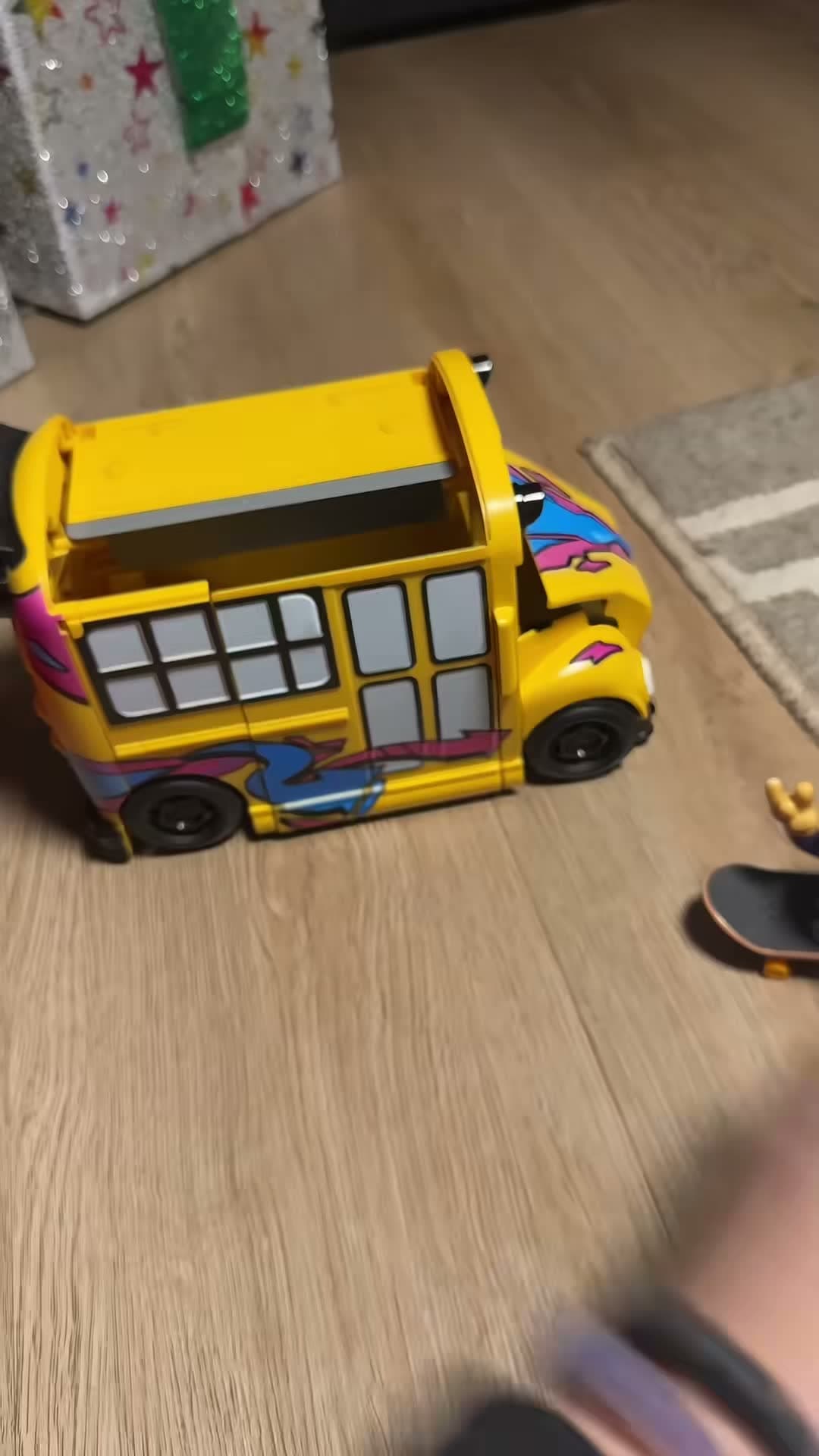 Kristen Rose reviewing a toy set at home